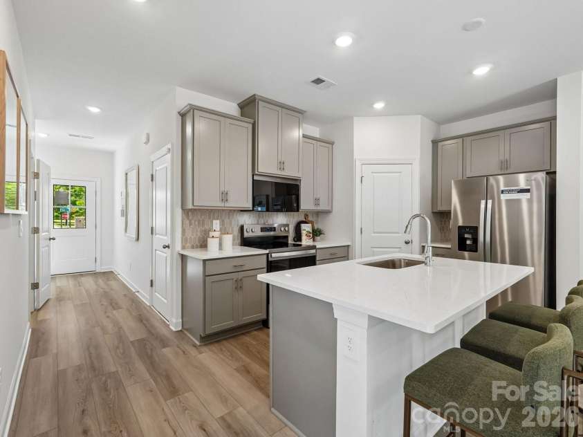 3117 Ophelia Alley, Charlotte, NC 28213.  MLS# CAR4386468, YatesRealty ID 29694. Photo is not of the actual home, but is an inspirational photo of builder’s model home and may depict options, furnishings, and/or decorator features that are not included