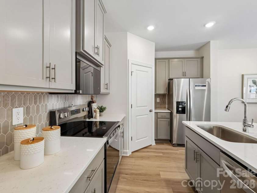 3117 Ophelia Alley, Charlotte, NC 28213.  MLS# CAR4386468, YatesRealty ID 29694. Photo is not of the actual home, but is an inspirational photo of builder’s model home and may depict options, furnishings, and/or decorator features that are not included