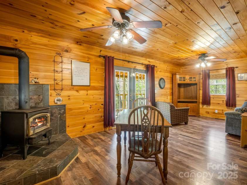 147 Cove Hollow Road, Rutherfordton, NC 28139.  MLS# CAR4246761, YatesRealty ID 29699. Fire in woodstove is virtual.