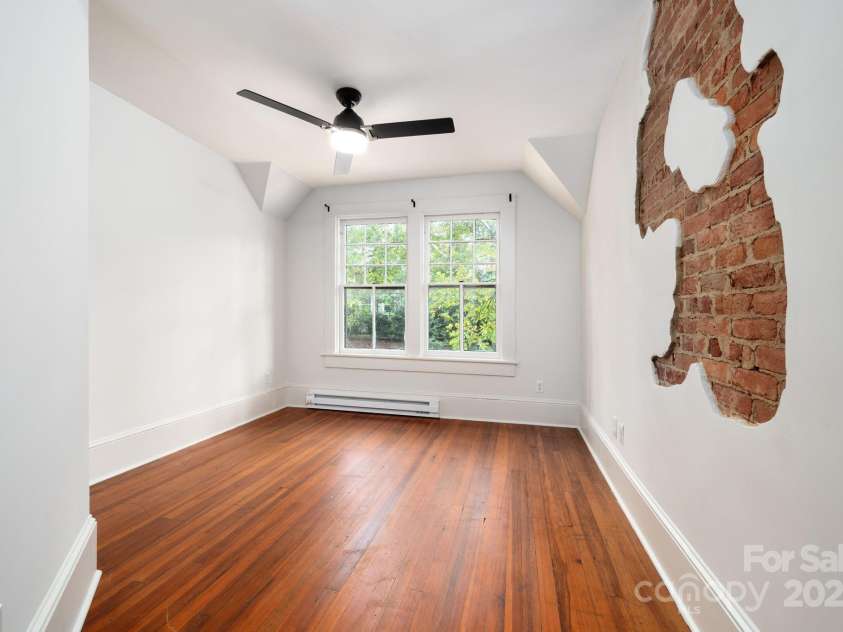 11 Cullowhee Street, Asheville, NC 28801.  MLS# CAR4307173, YatesRealty ID 297. Exposed Brick and Updated Fixture