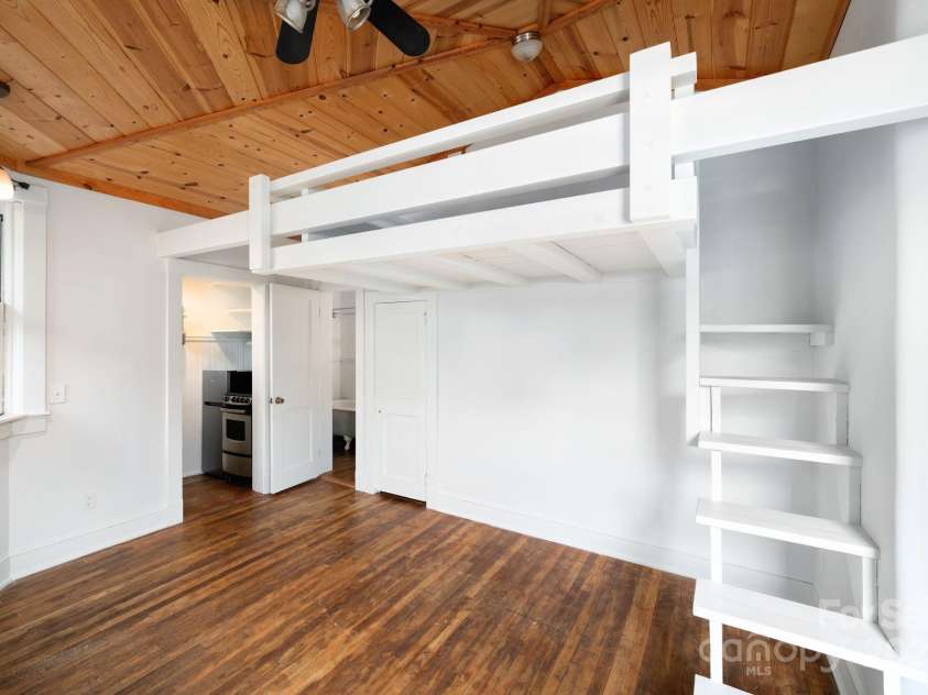 11 Cullowhee Street, Asheville, NC 28801.  MLS# CAR4307173, YatesRealty ID 297. Loft Bed and Living Space