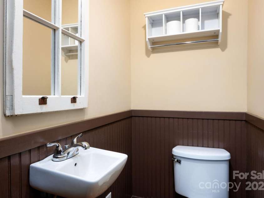 11 Cullowhee Street, Asheville, NC 28801.  MLS# CAR4307173, YatesRealty ID 297. Main Level Half Bath