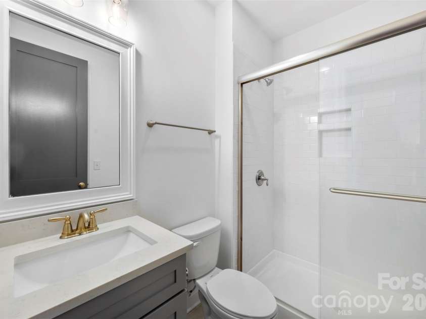 16709 Mckee Road, Charlotte, NC 28278.  MLS# CAR4388215, YatesRealty ID 29700. Guest Bathroom - Main Level
