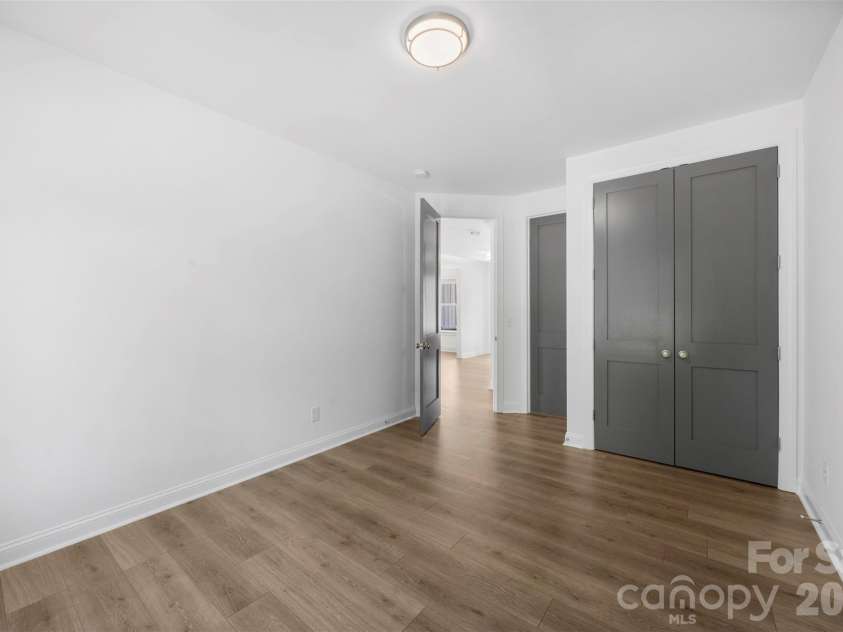 16709 Mckee Road, Charlotte, NC 28278.  MLS# CAR4388215, YatesRealty ID 29700. Main Level Guest Bedroom