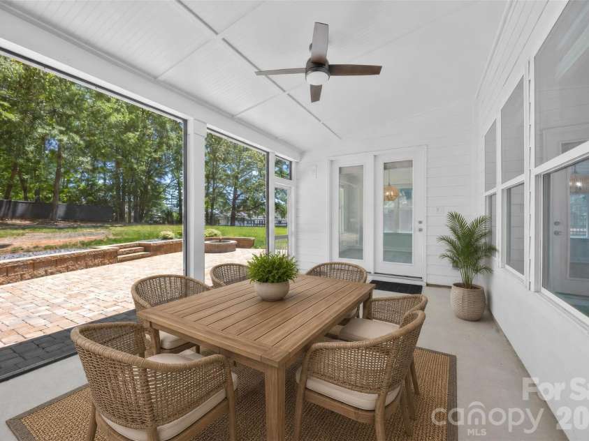 16709 Mckee Road, Charlotte, NC 28278.  MLS# CAR4388215, YatesRealty ID 29700. Screened Porch - virtually staged