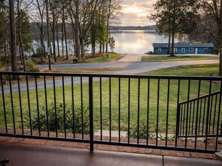 182 Broadview Circle, Mooresville, NC 28117.  MLS# CAR4352412, YatesRealty ID 29701. Enjoy lake views from the front porch!
