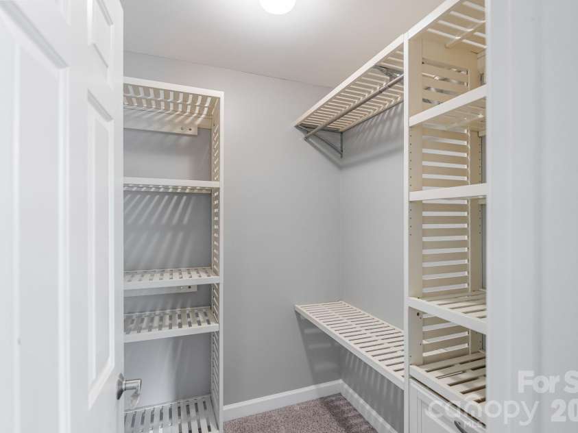 182 Broadview Circle, Mooresville, NC 28117.  MLS# CAR4352412, YatesRealty ID 29701. Walk-in closet with built-ins