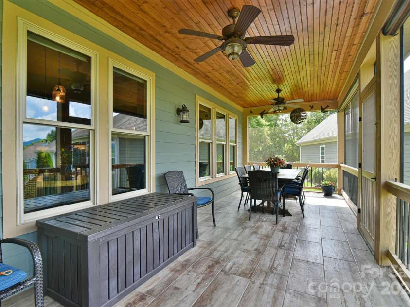 35 Dreambird Drive, Leicester, NC 28748.  MLS# CAR4281795, YatesRealty ID 29701. Back Screened Porch