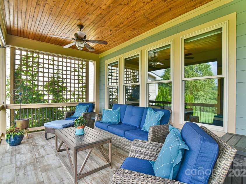 35 Dreambird Drive, Leicester, NC 28748.  MLS# CAR4281795, YatesRealty ID 29701. Back Screened Porch