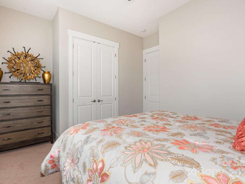 21016 Molly Harper Drive, Cornelius, NC 28031.  MLS# CAR4320388, YatesRealty ID 29705. Large closet and dresser space in the main floor guest suite