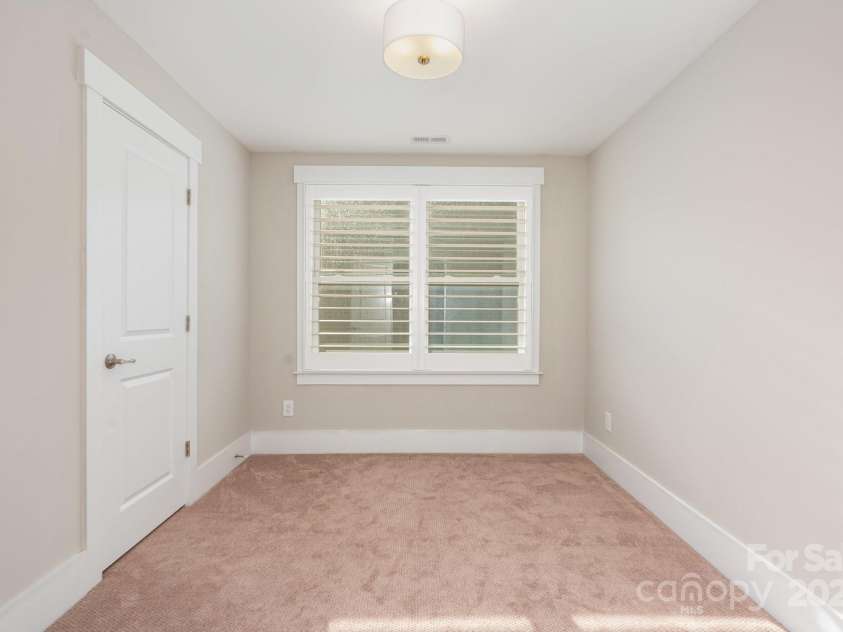 21016 Molly Harper Drive, Cornelius, NC 28031.  MLS# CAR4320388, YatesRealty ID 29705. Need another bedroom upstairs, you've got it! Perfect as a bedroom when you have a full house, or a wonderful craft space. It features a very large walk in closet AND a walk-in storage room beyond! This home has a