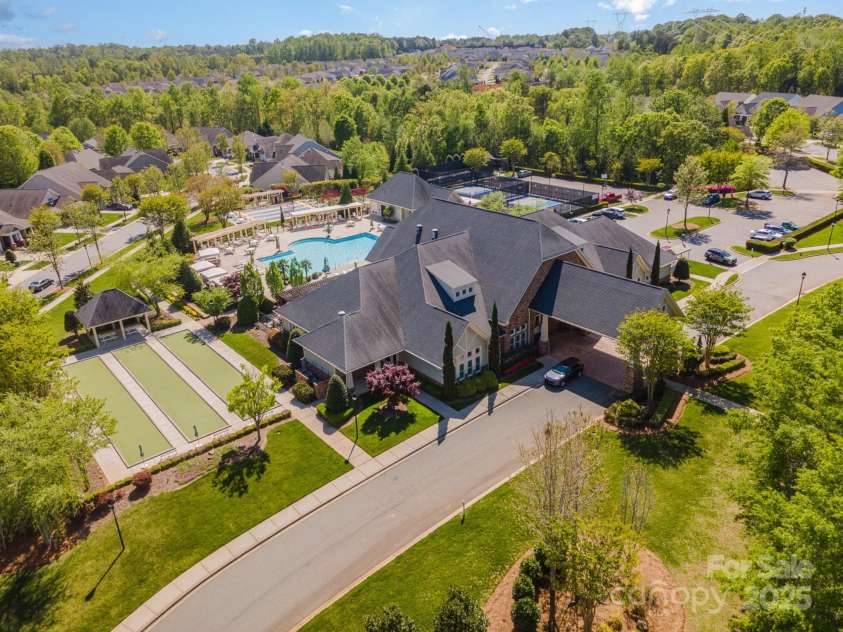 21016 Molly Harper Drive, Cornelius, NC 28031.  MLS# CAR4320388, YatesRealty ID 29705. Original Meetinghouse Clubhouse and amenities. Second clubhouse in The Forest is under construction and The Oasis will offer resort style living! 
