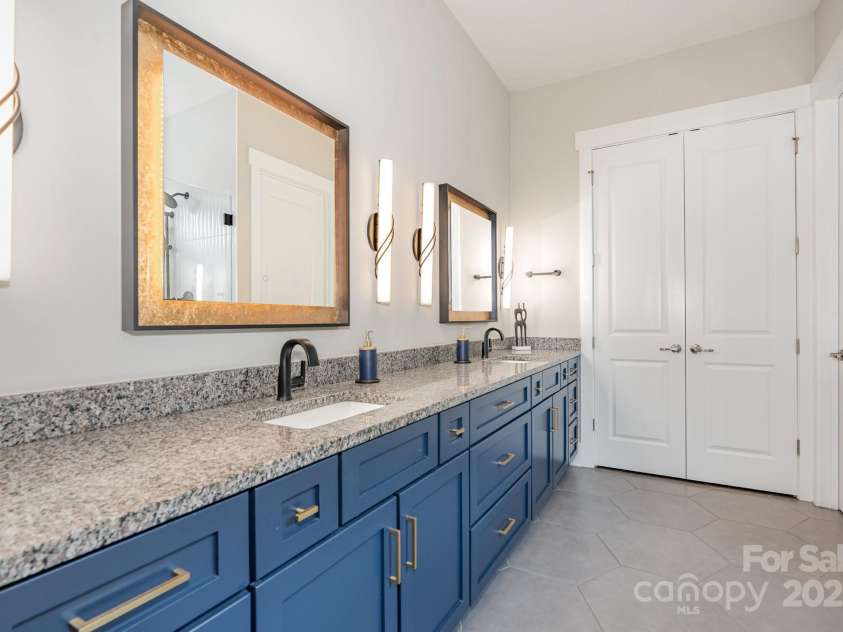 21016 Molly Harper Drive, Cornelius, NC 28031.  MLS# CAR4320388, YatesRealty ID 29705. Wonderful counter space and pretty cabinetry