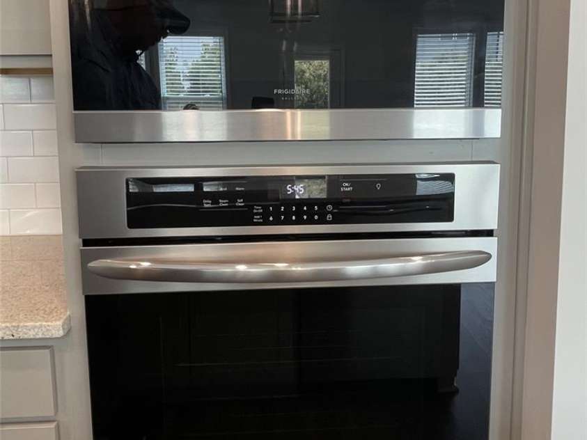 7037 Messina Road, Fort Mill, SC 29707.  MLS# CAR4286750, YatesRealty ID 29706. Gas wall oven with microwave above