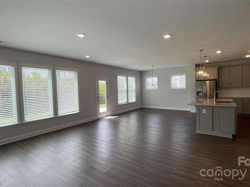 7037 Messina Road, Fort Mill, SC 29707.  MLS# CAR4286750, YatesRealty ID 29706. Kitchen and Dining Area