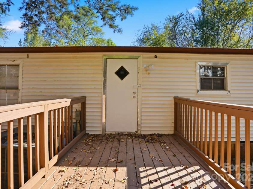 115 Red Bud Place, Concord, NC 28027.  MLS# CAR4316822, YatesRealty ID 2971. Back Deck