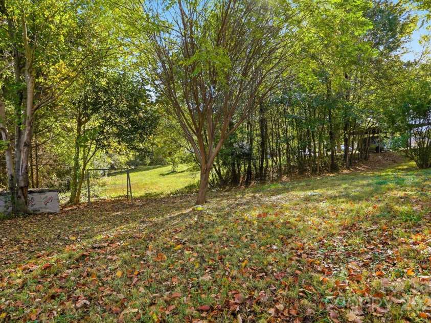 115 Red Bud Place, Concord, NC 28027.  MLS# CAR4316822, YatesRealty ID 2971. Front Yard