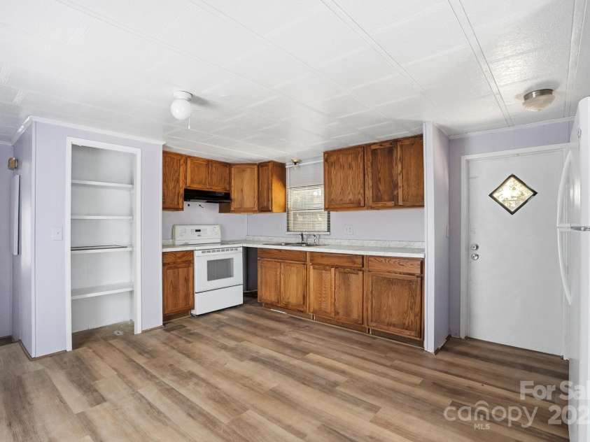 115 Red Bud Place, Concord, NC 28027.  MLS# CAR4316822, YatesRealty ID 2971. Kitchen