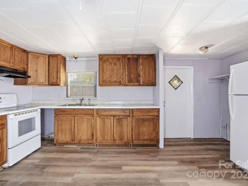 115 Red Bud Place, Concord, NC 28027.  MLS# CAR4316822, YatesRealty ID 2971. Kitchen
