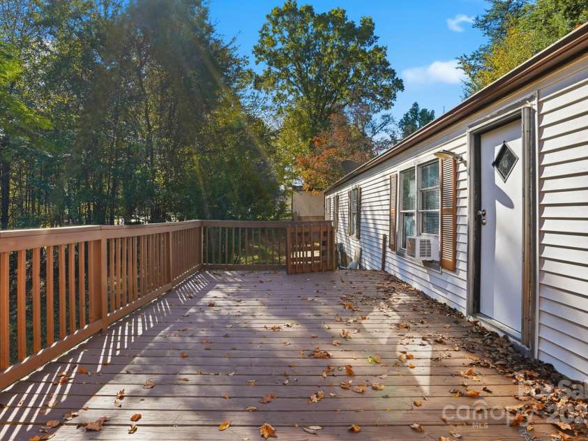 115 Red Bud Place, Concord, NC 28027.  MLS# CAR4316822, YatesRealty ID 2971. Large front Deck