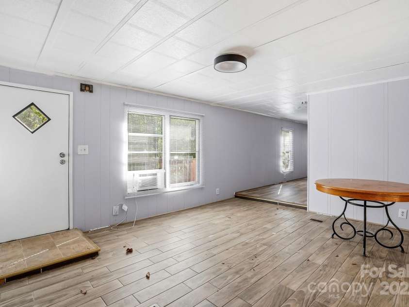 115 Red Bud Place, Concord, NC 28027.  MLS# CAR4316822, YatesRealty ID 2971. Living Room