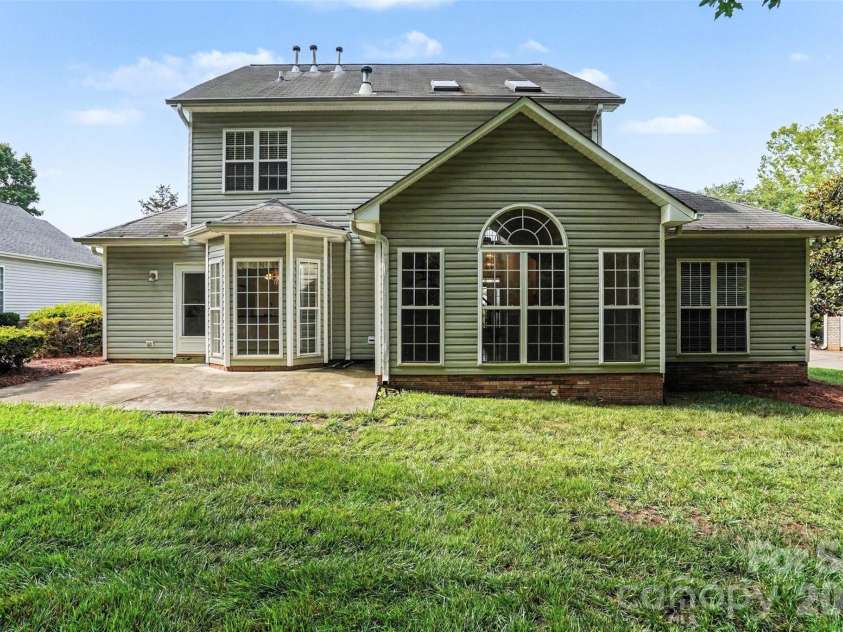 3365 Garrett Drive, Concord, NC 28027.  MLS# CAR4387307, YatesRealty ID 29712. Backyard