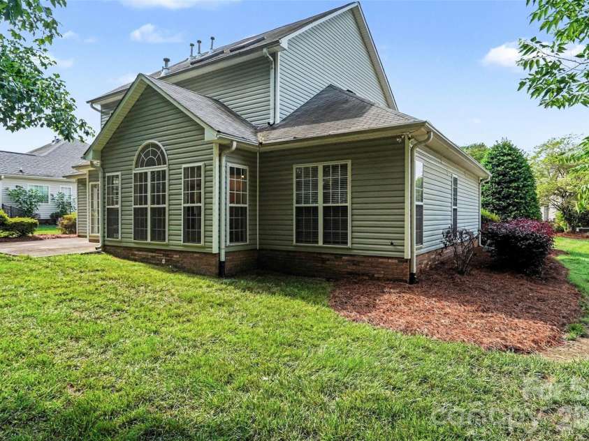 3365 Garrett Drive, Concord, NC 28027.  MLS# CAR4387307, YatesRealty ID 29712. Backyard