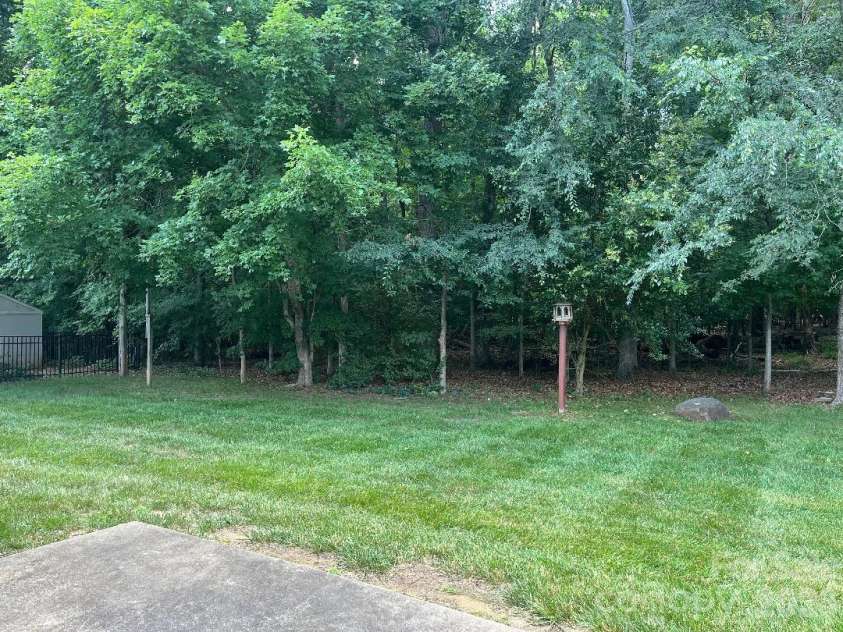 3365 Garrett Drive, Concord, NC 28027.  MLS# CAR4387307, YatesRealty ID 29712. Backyard