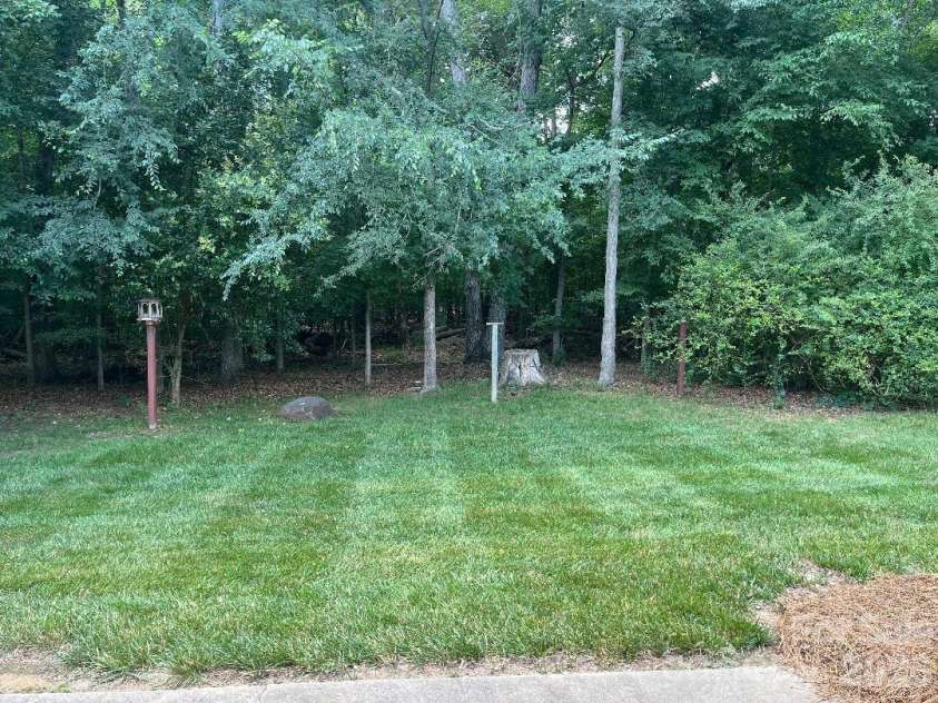 3365 Garrett Drive, Concord, NC 28027.  MLS# CAR4387307, YatesRealty ID 29712. Backyard