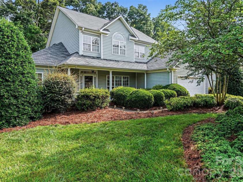 3365 Garrett Drive, Concord, NC 28027.  MLS# CAR4387307, YatesRealty ID 29712. Front Yard Landscaped for Privacy