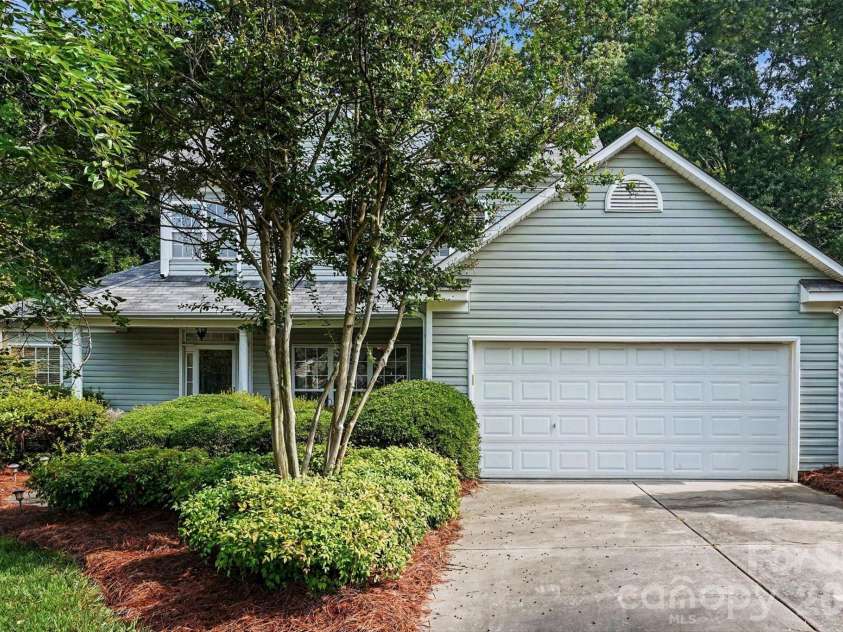 3365 Garrett Drive, Concord, NC 28027.  MLS# CAR4387307, YatesRealty ID 29712. Front Yard Landscaped for Privacy