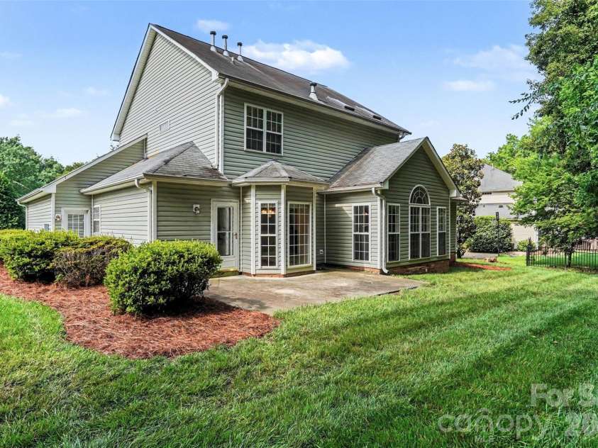 3365 Garrett Drive, Concord, NC 28027.  MLS# CAR4387307, YatesRealty ID 29712. Private Backyard with Trees