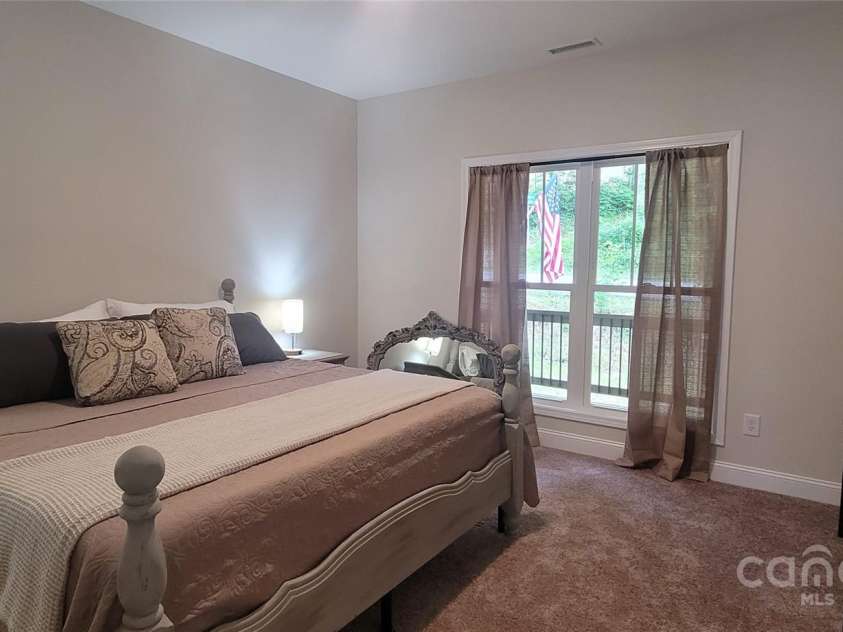 132 Connestee Road, Brevard, NC 28712.  MLS# CAR4263922, YatesRealty ID 29713. 