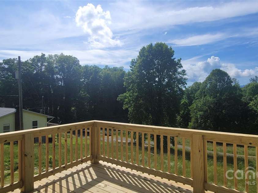 132 Connestee Road, Brevard, NC 28712.  MLS# CAR4263922, YatesRealty ID 29713. 