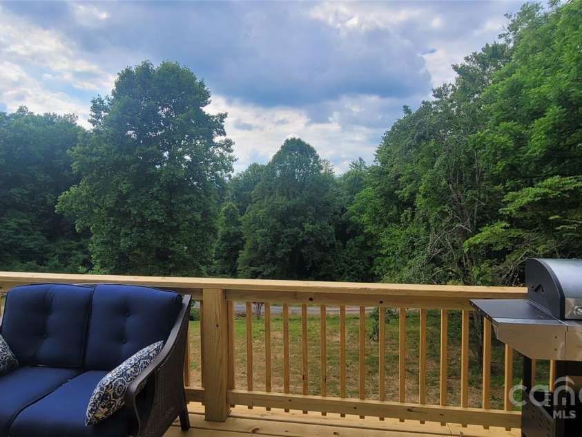 132 Connestee Road, Brevard, NC 28712.  MLS# CAR4263922, YatesRealty ID 29713. 