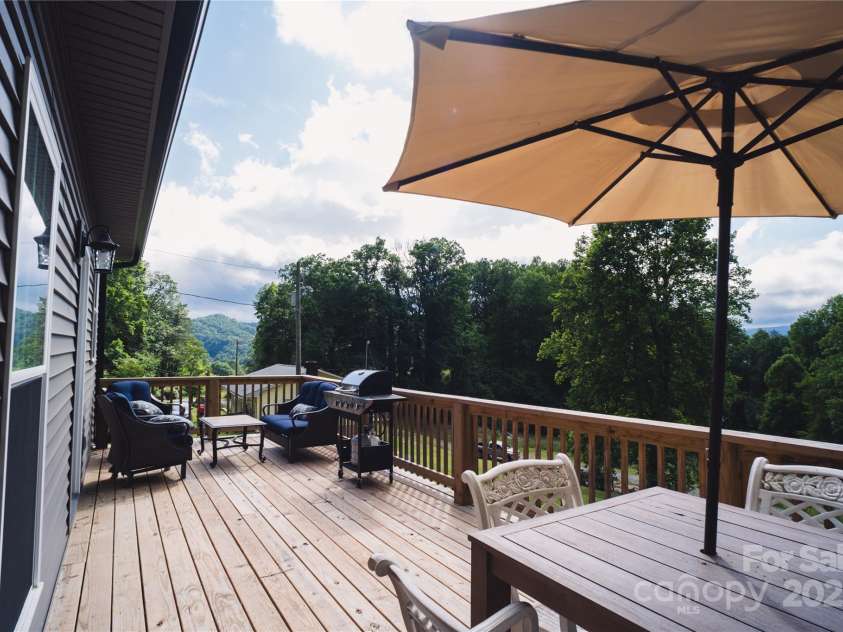 132 Connestee Road, Brevard, NC 28712.  MLS# CAR4263922, YatesRealty ID 29713. 