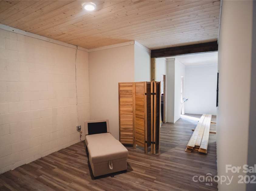 132 Connestee Road, Brevard, NC 28712.  MLS# CAR4263922, YatesRealty ID 29713. 