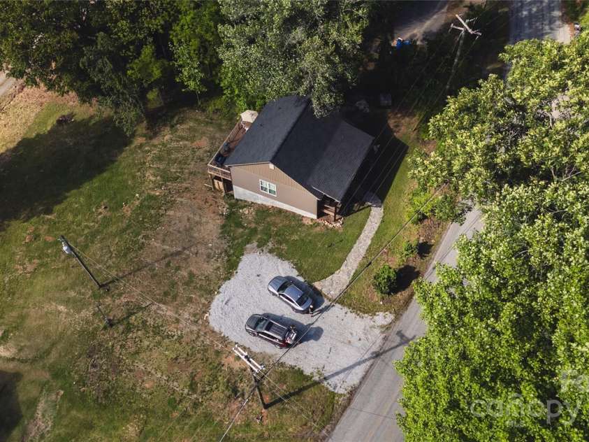 132 Connestee Road, Brevard, NC 28712.  MLS# CAR4263922, YatesRealty ID 29713. 