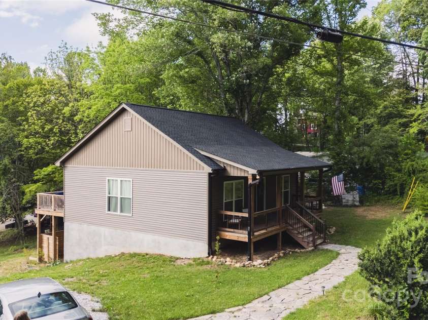 132 Connestee Road, Brevard, NC 28712.  MLS# CAR4263922, YatesRealty ID 29713. 