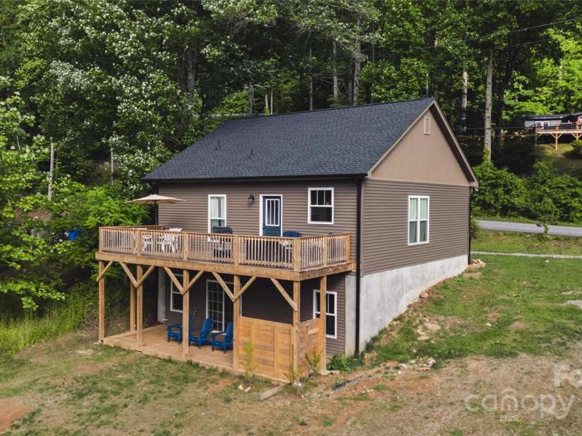 132 Connestee Road, Brevard, NC 28712.  MLS# CAR4263922, YatesRealty ID 29713. 