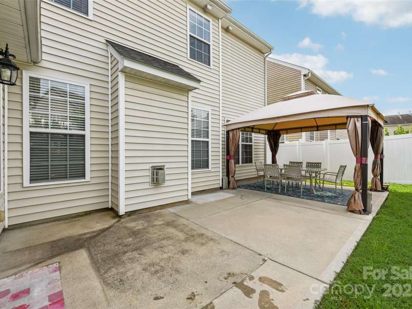 3351 Streamside Drive, Davidson, NC 28036.  MLS# CAR4268849, YatesRealty ID 29714. Extended back patio