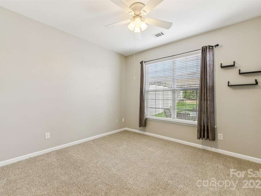 3351 Streamside Drive, Davidson, NC 28036.  MLS# CAR4268849, YatesRealty ID 29714. Guest Bedroom #1 on Main floor