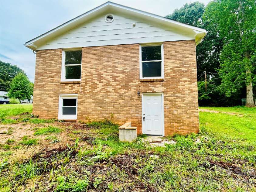 400 Ponderosa Road, Stanley, NC 28164.  MLS# CAR4388846, YatesRealty ID 29730. Entrance to basement