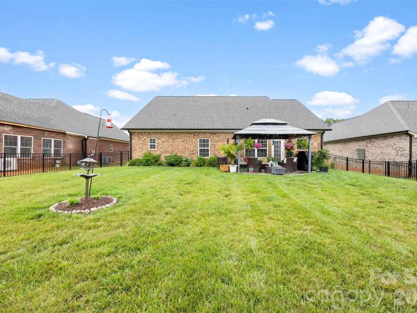 268 Ella Drive, Locust, NC 28097.  MLS# CAR4386566, YatesRealty ID 29732. Back Yard