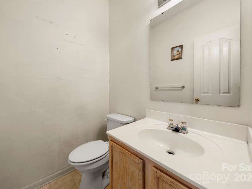 4033 Lakota Court, Charlotte, NC 28269.  MLS# CAR4286797, YatesRealty ID 29733. Half bath