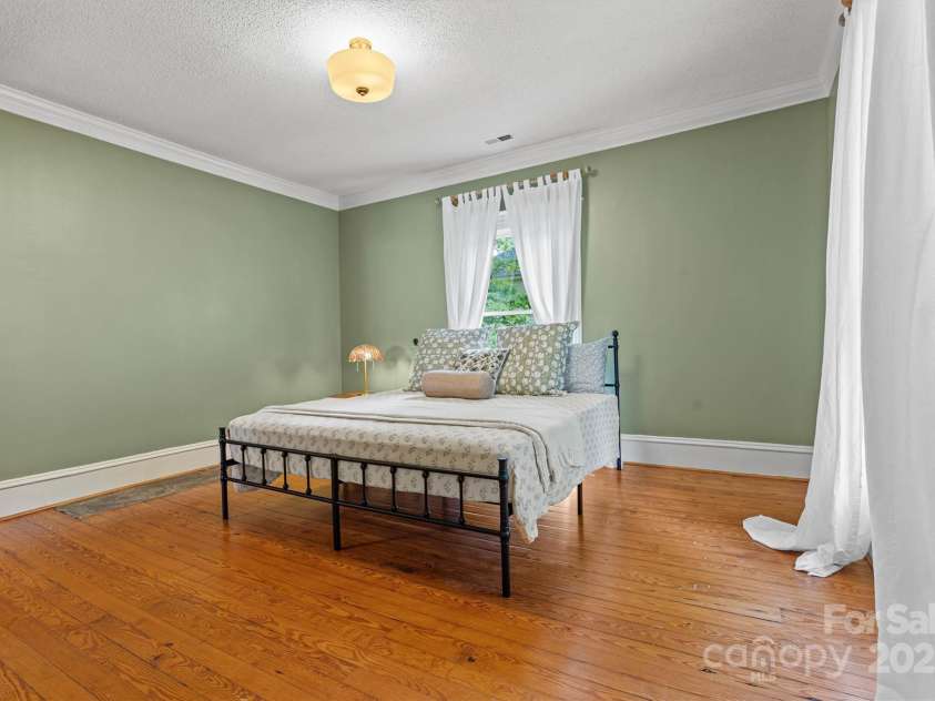 345 Center Avenue, Mooresville, NC 28115.  MLS# CAR4283035, YatesRealty ID 29735. Primary Bedroom comfortably accommodates a king size bed