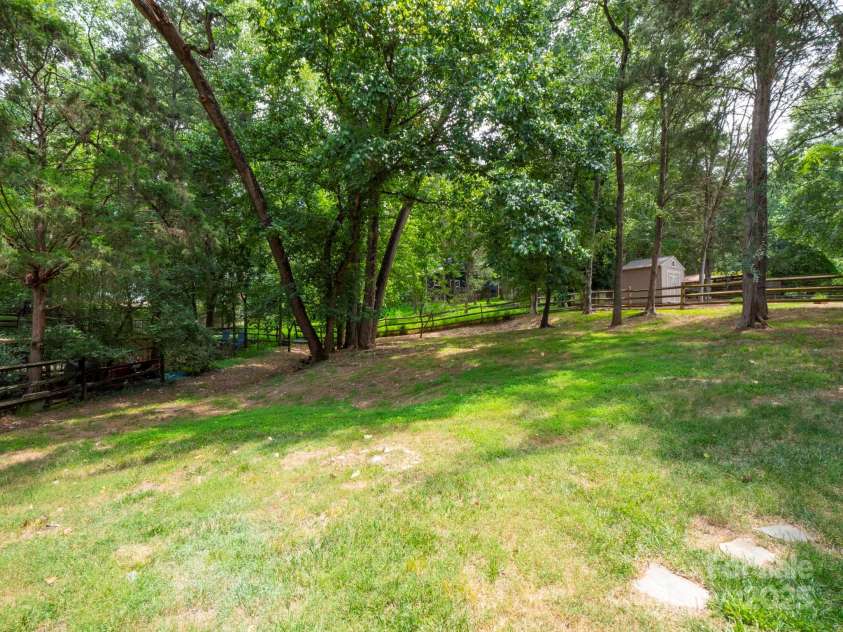 8301 Tifton Road, Charlotte, NC 28226.  MLS# CAR4275465, YatesRealty ID 29738. Partially fence yard