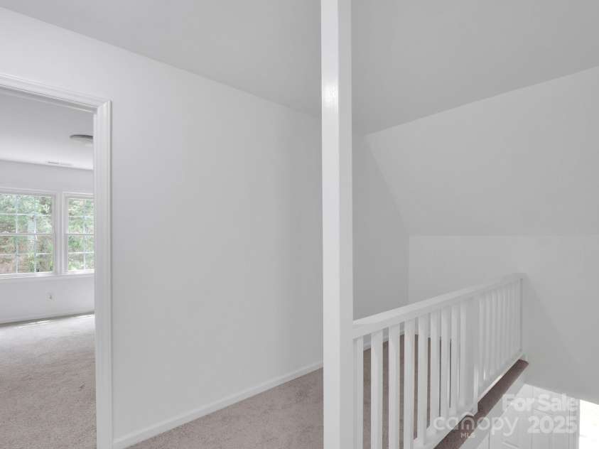 8301 Tifton Road, Charlotte, NC 28226.  MLS# CAR4275465, YatesRealty ID 29738. Second floor landing and work space