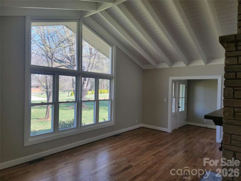 1820 Connelly Springs Road, Lenoir, NC 28645.  MLS# CAR4374509, YatesRealty ID 29739. Living Room with true wood burning fireplace