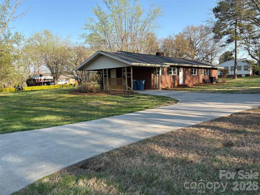 1820 Connelly Springs Road, Lenoir, NC 28645.  MLS# CAR4374509, YatesRealty ID 29739. Rear of Home faces West